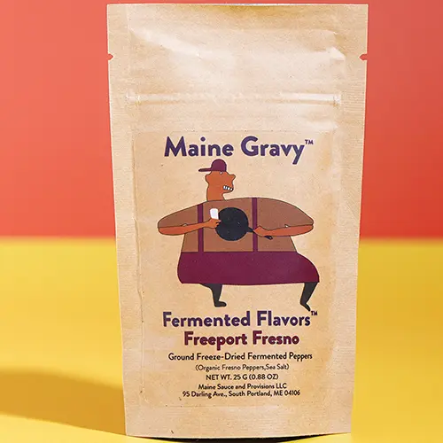 Fermented Flavors Freeport Fresno seasoning pouch on a colored background