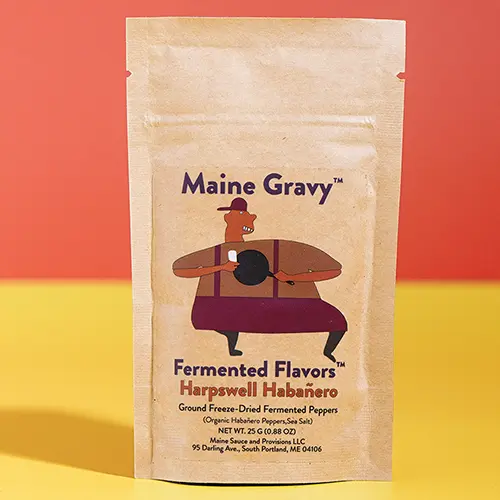 Fermented Flavors Harpswell Habanero seasoning pouch on a colored background
