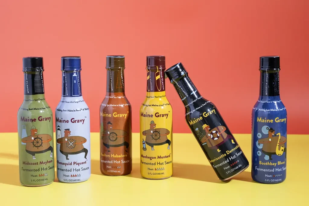 Maine Gravy Bottles, with one leaning on another